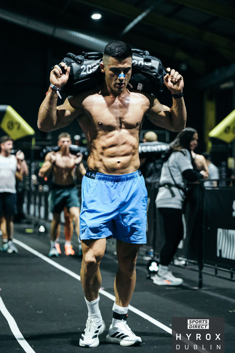 Sandbag carry at HYROX Dublin