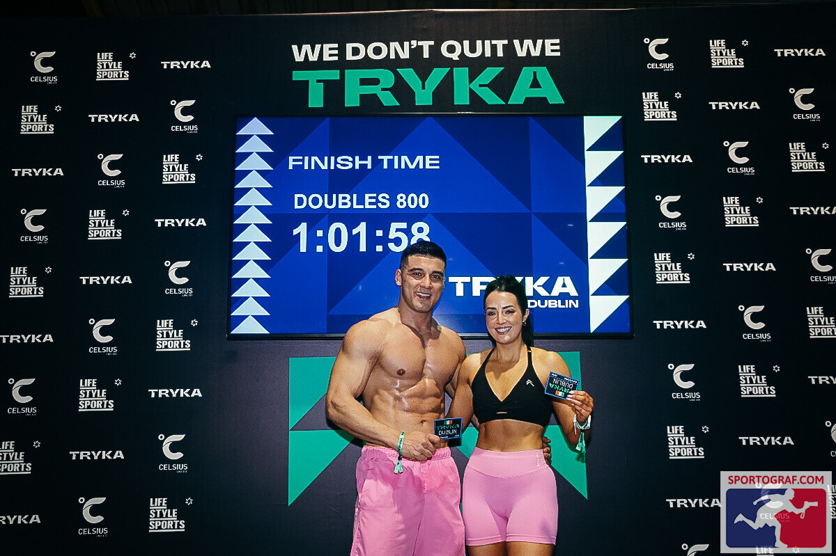 Coach M.M.X and partner at the TRYKA Dublin finish board, doubles 1:01:58