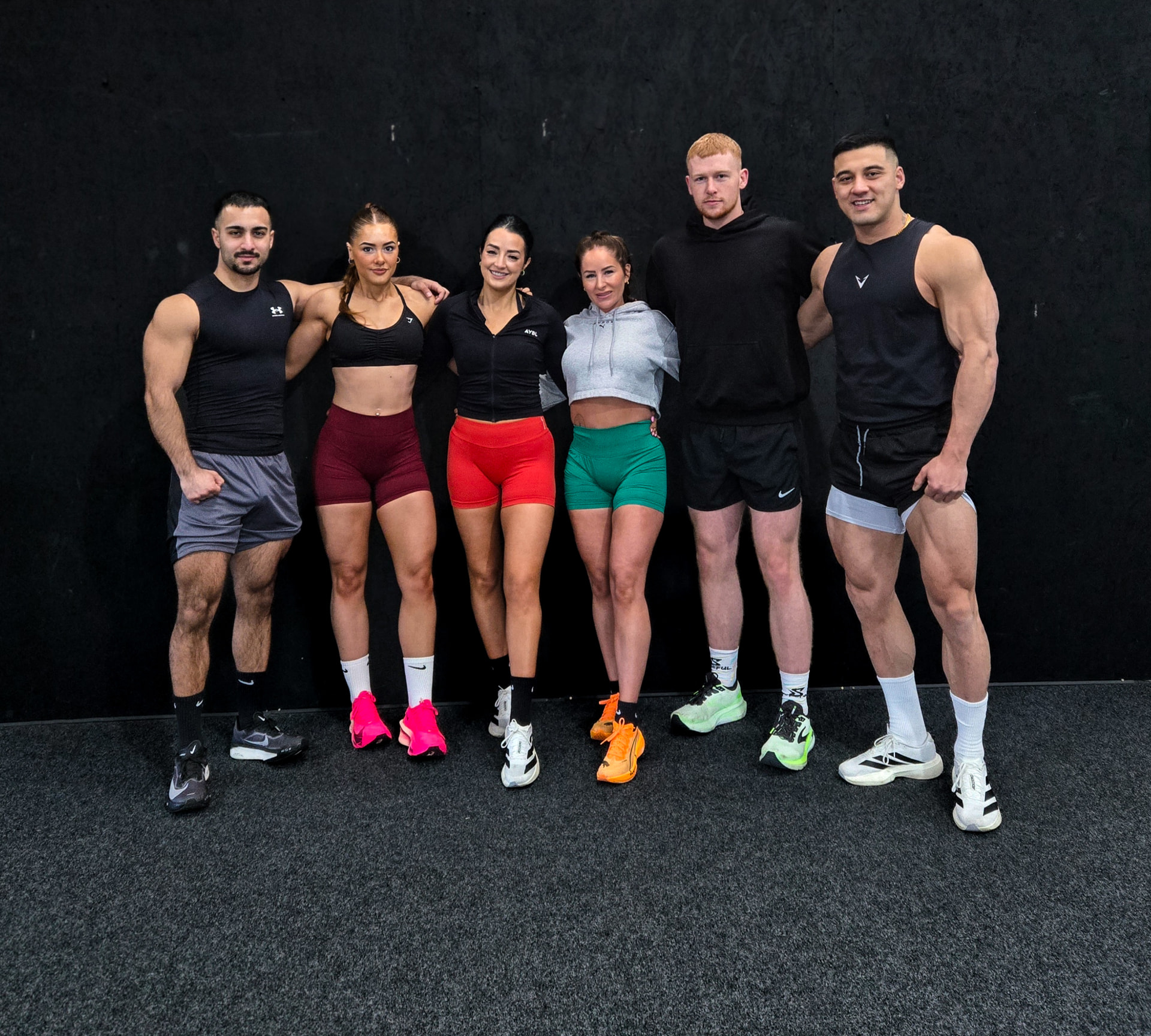 Coach M.M.X with his training group in the gym